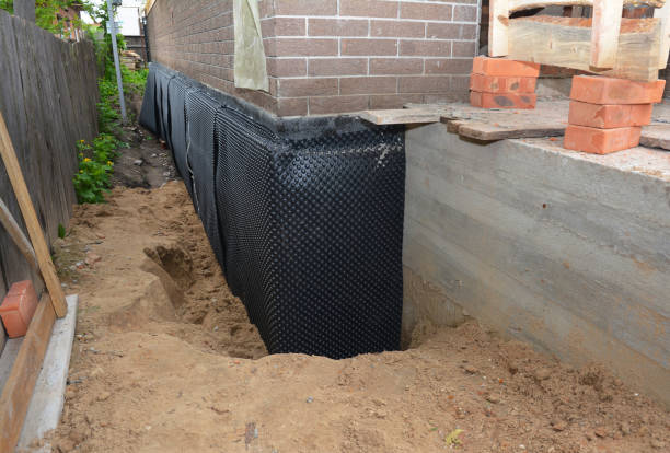 Happy homeowners after waterproofing job in Oldenburg